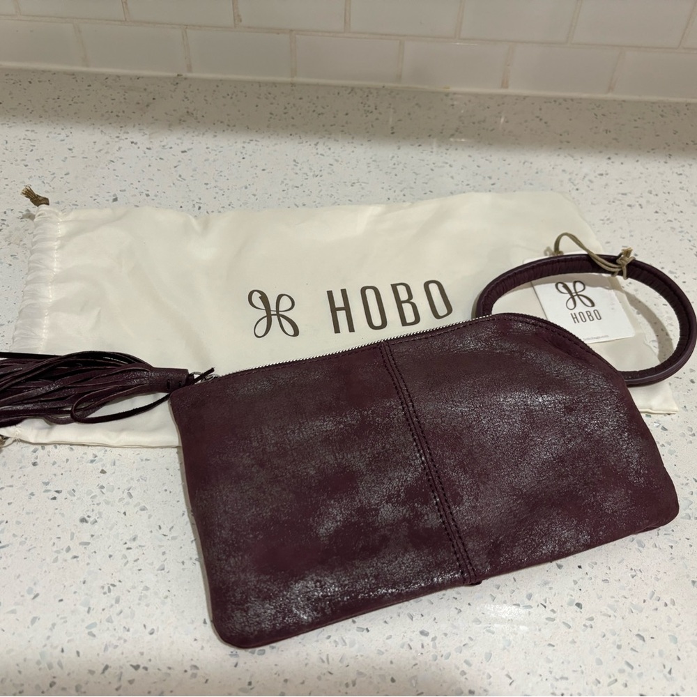 NWT HOBO Sable wristlet metallic, plum, graphite